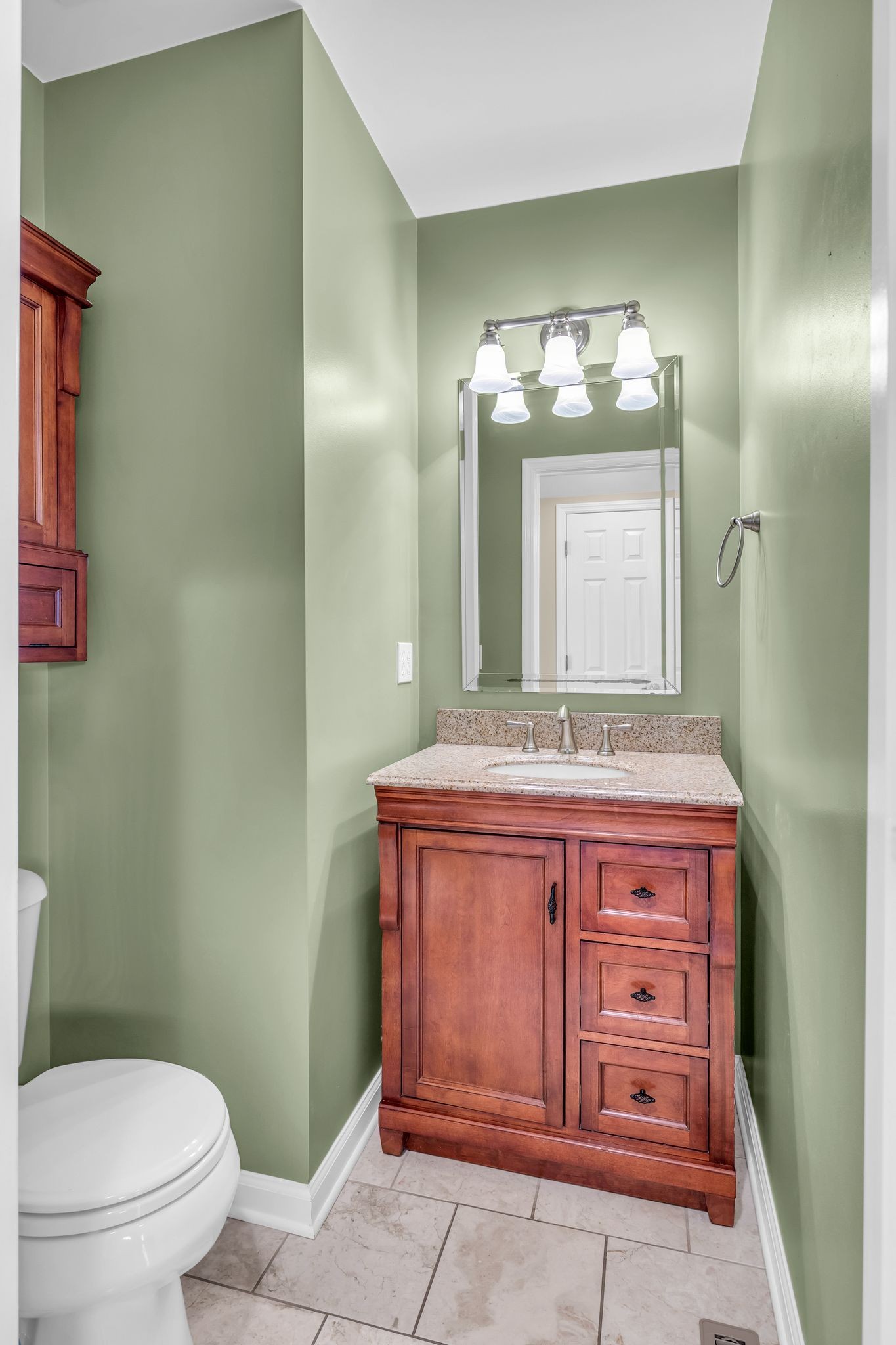 105 Lagan Court Franklin, TN 37064 - Photo 20 of 51 a bathroom with a granite countertop sink a toilet and a mirror