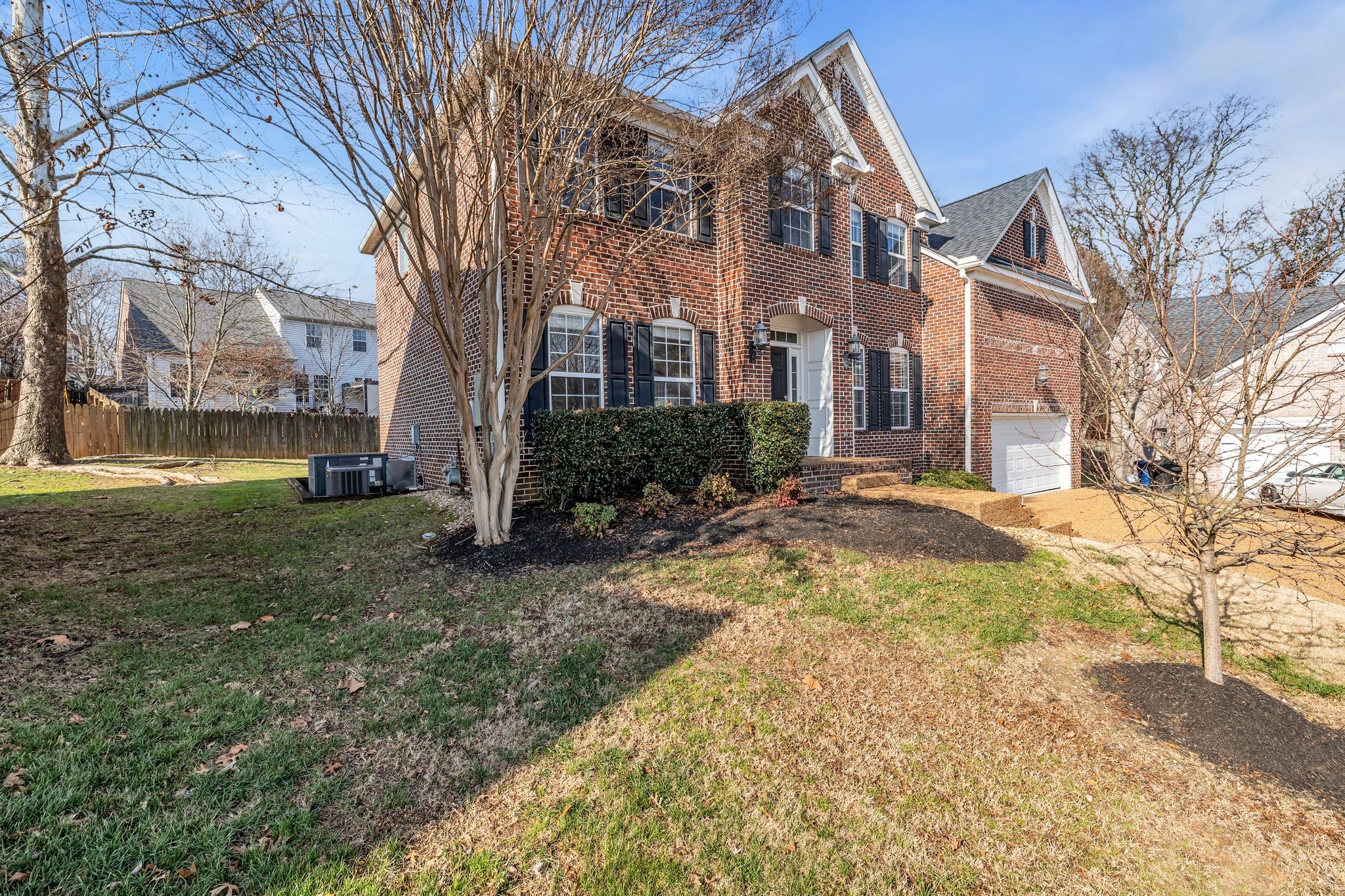 105 Lagan Court Franklin, TN 37064 - Photo 2 of 51 a view of a yard in front of a building