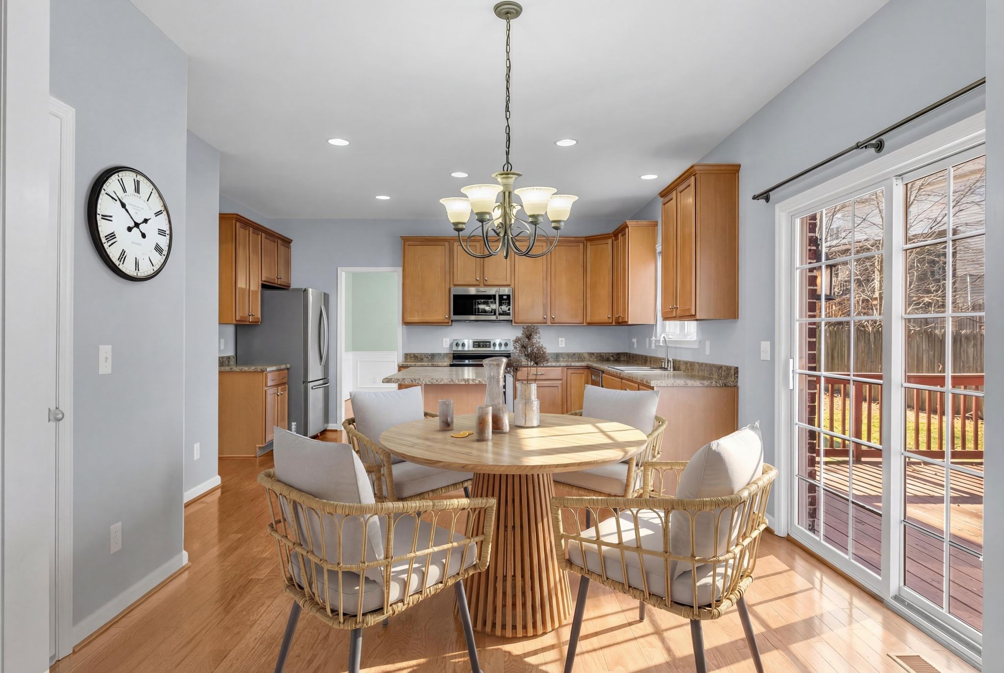 105 Lagan Court Franklin, TN 37064 - Photo 21 of 51 a dining room with chandelier and wooden floor