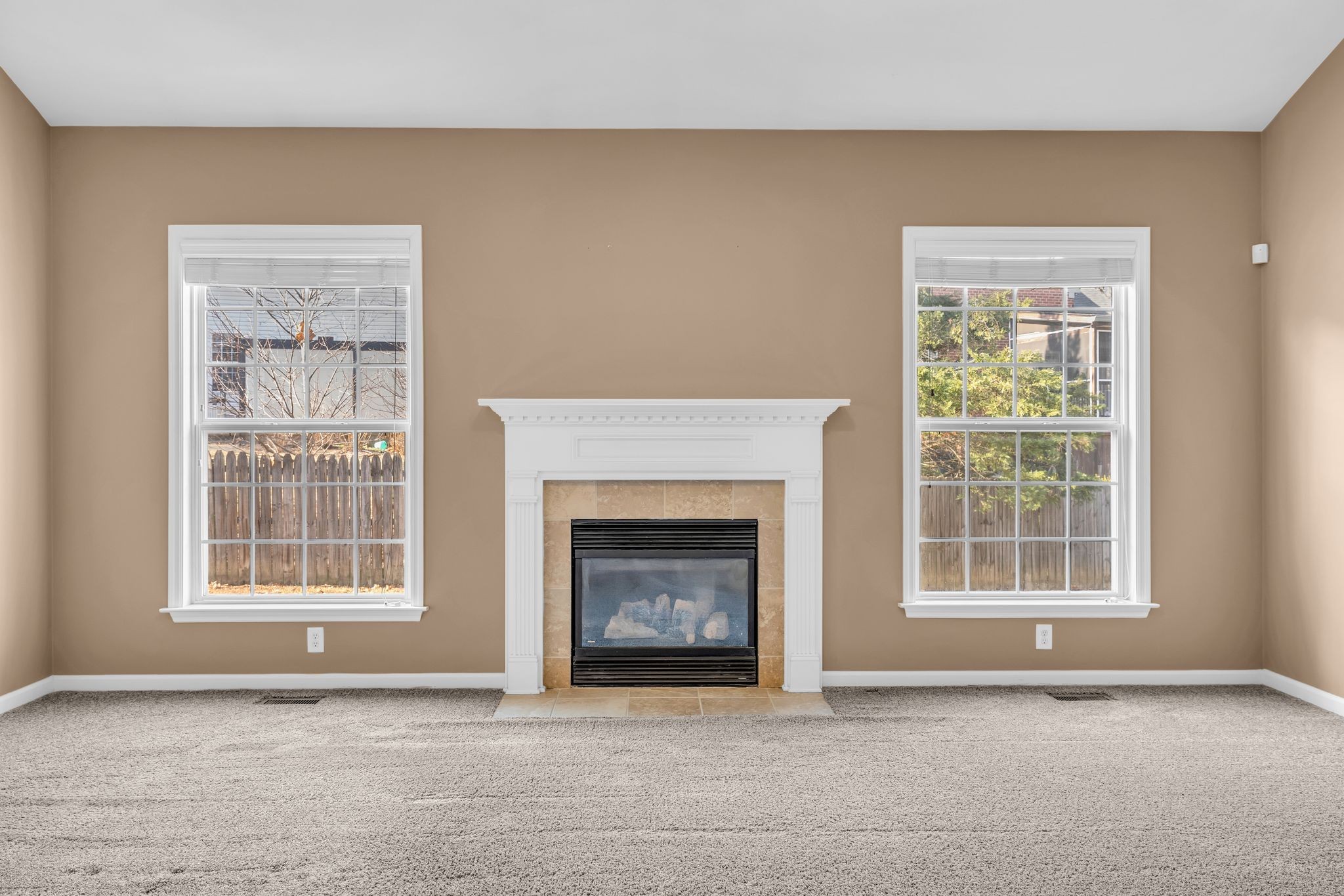105 Lagan Court Franklin, TN 37064 - Photo 26 of 51 a view of an empty room with a window and fireplace