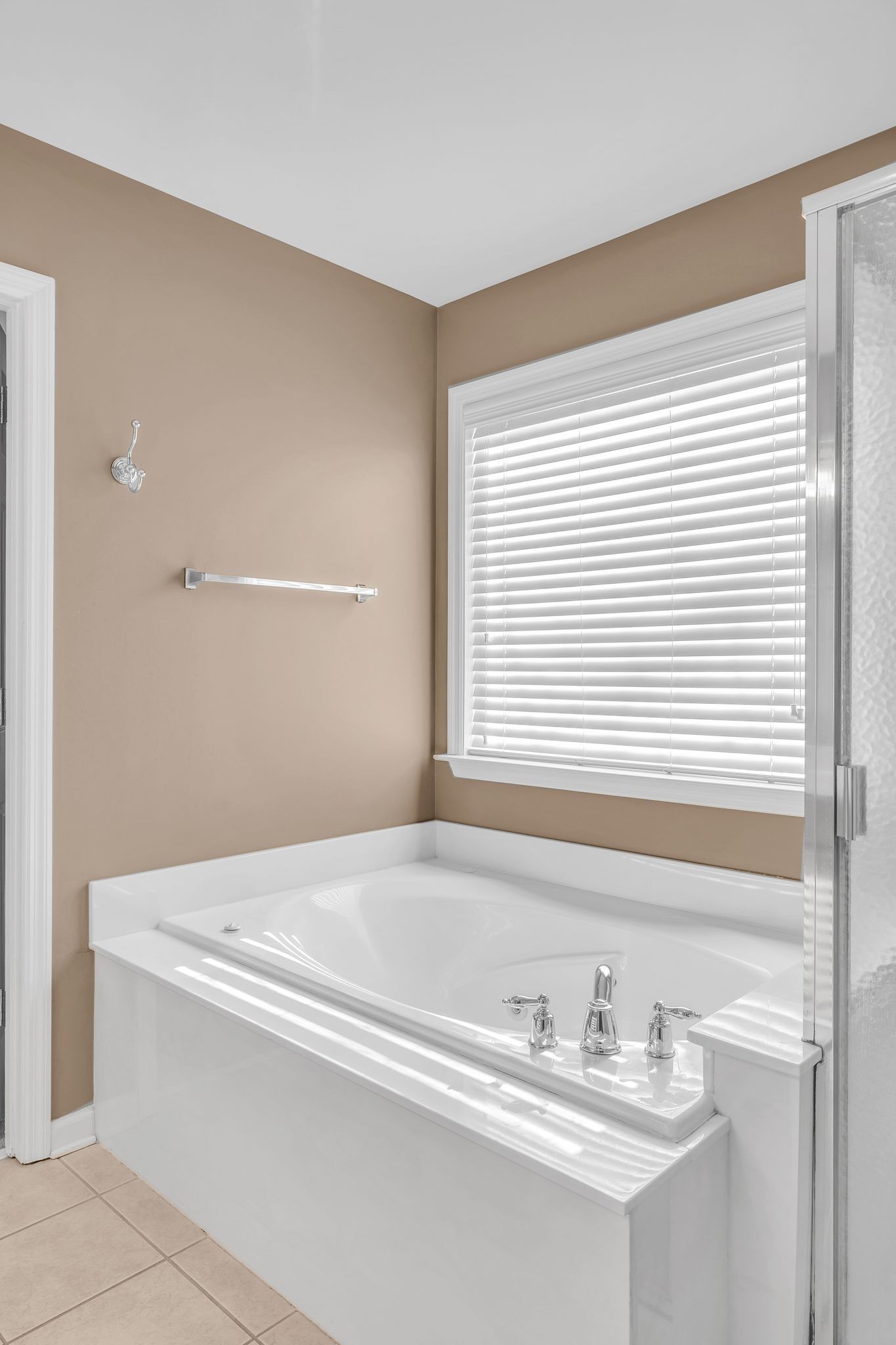 105 Lagan Court Franklin, TN 37064 - Photo 30 of 51 a bathroom with a bathtub and a sink