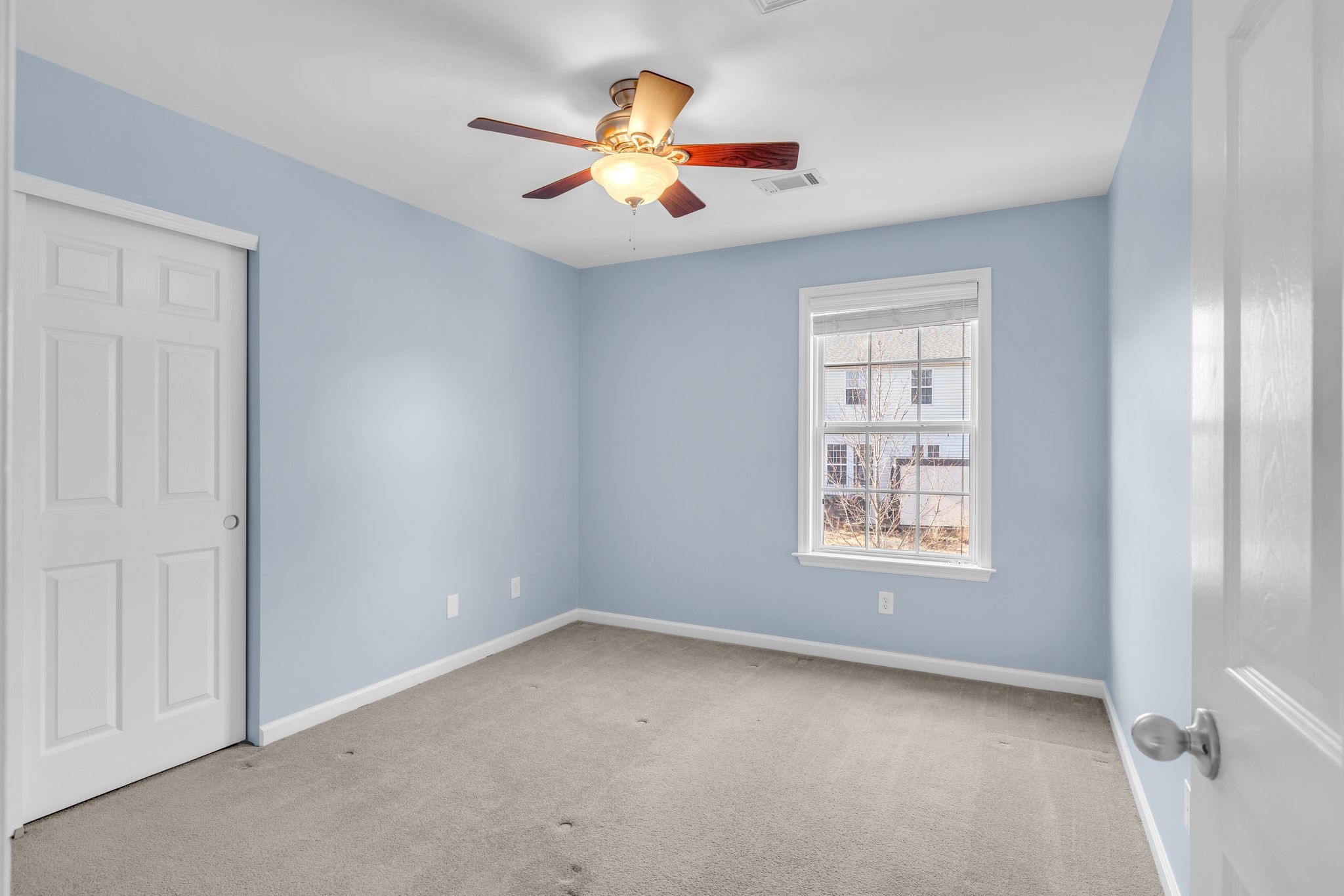 105 Lagan Court Franklin, TN 37064 - Photo 33 of 51 an empty room with closet and window