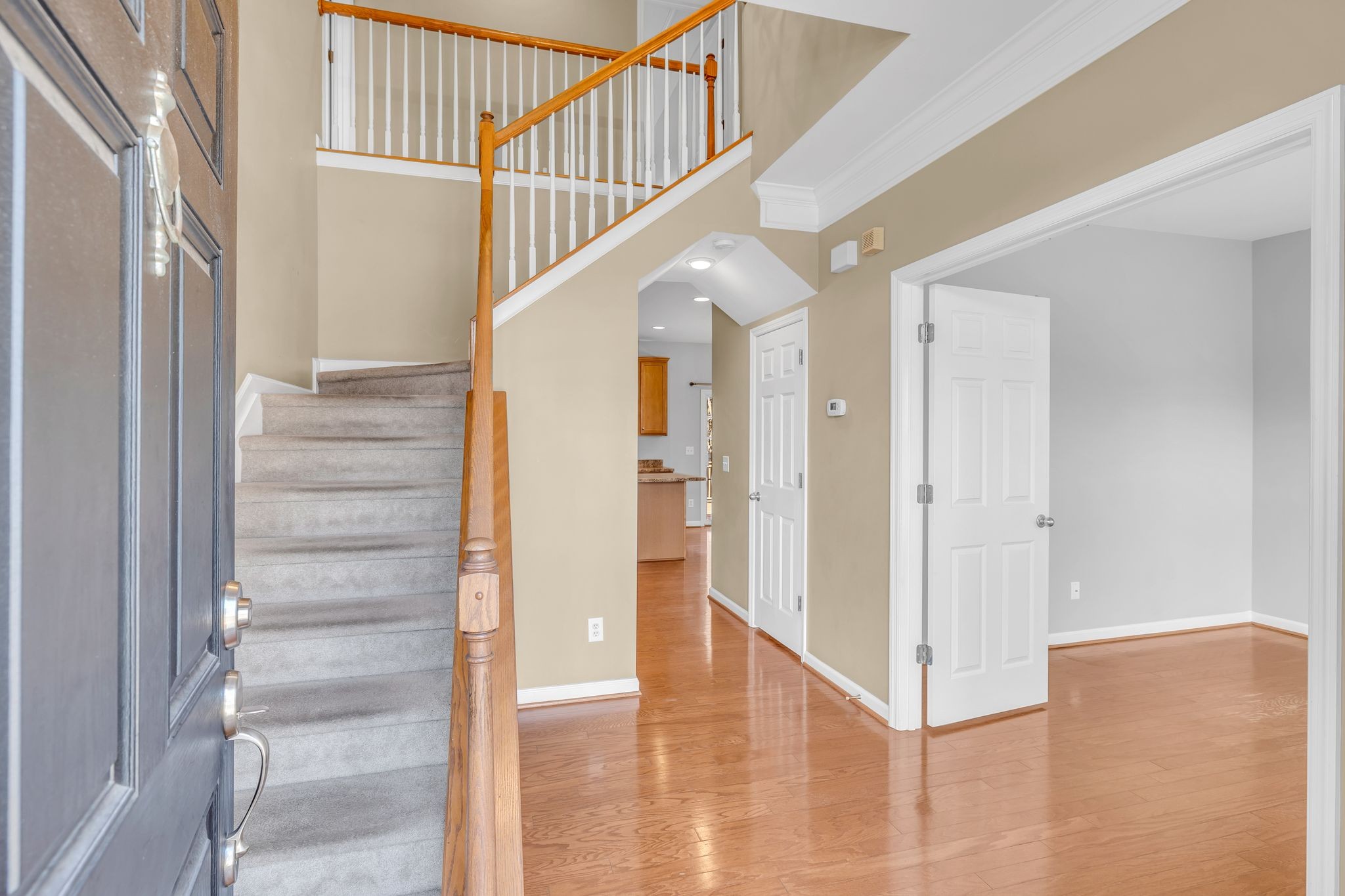 105 Lagan Court Franklin, TN 37064 - Photo 5 of 51 a view of entryway and hall with wooden floor
