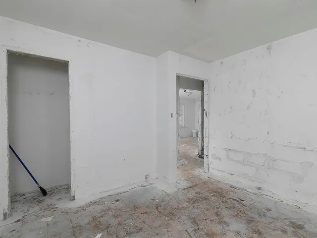 a bathroom with a bathtub and shower