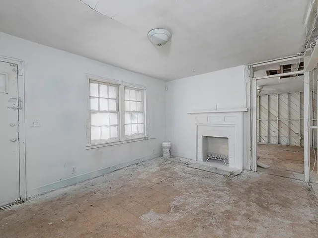 a view of a room with an entryway