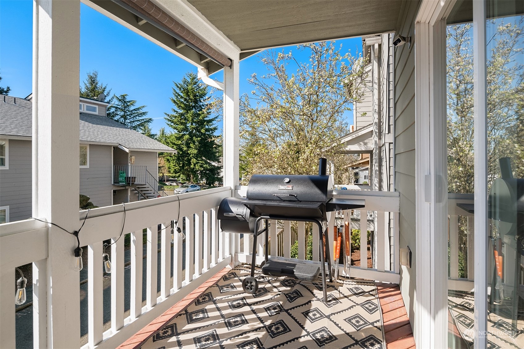 10217 Southeast 237th Street Kent, WA 98031 - Photo 23 of 28 a view of balcony with wooden floor