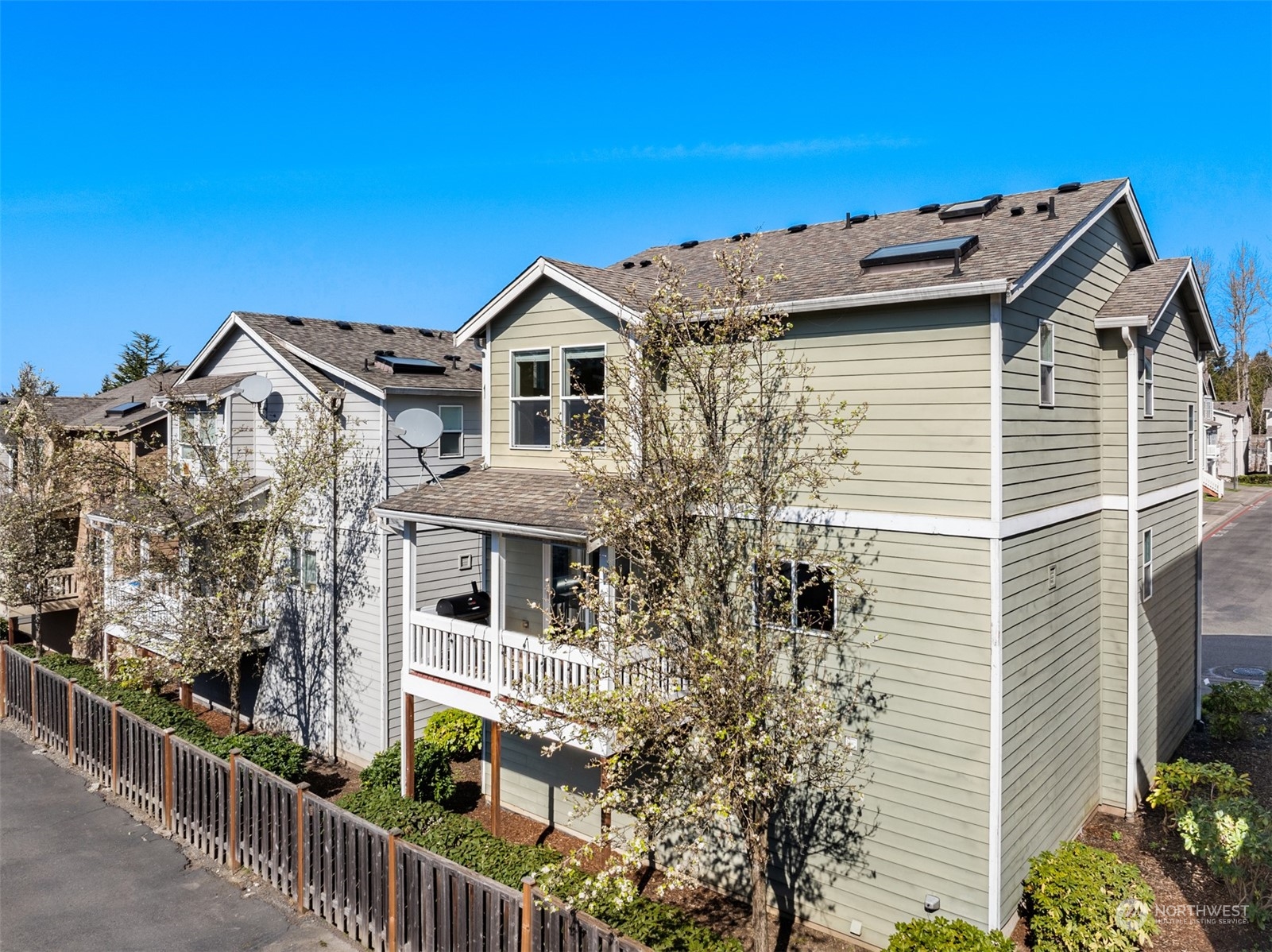 10217 Southeast 237th Street Kent, WA 98031 - Photo 25 of 28 a front view of a house with balcony