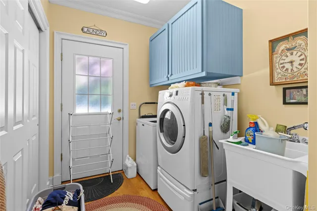 a storage room with washer and dryer