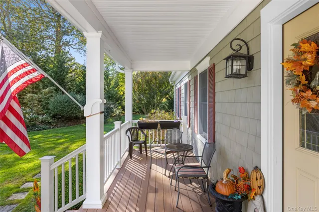 a view of balcony with furniture