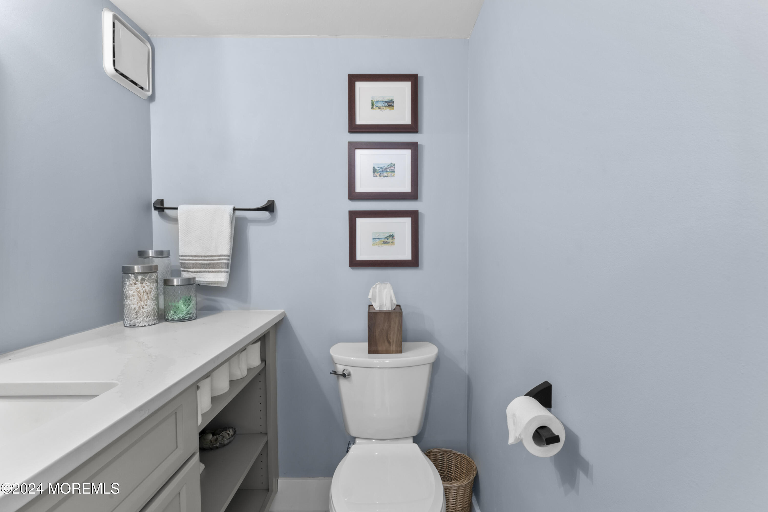 441 East Bay Avenue, Unit 10 Barnegat, NJ 08005 - Photo 21 of 53 a bathroom with a toilet a sink and mirror