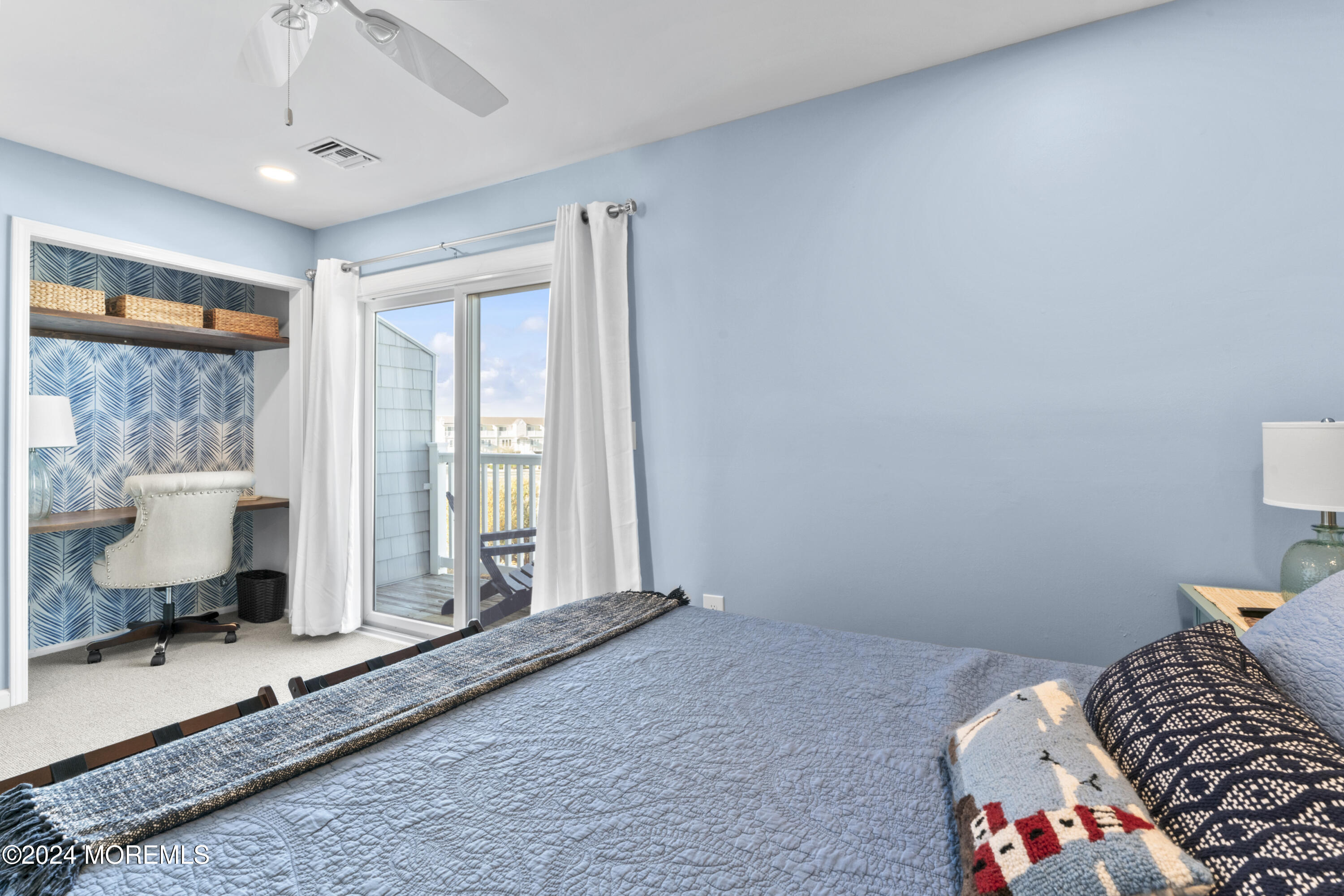 441 East Bay Avenue, Unit 10 Barnegat, NJ 08005 - Photo 30 of 53 a bedroom with a bed and large windows