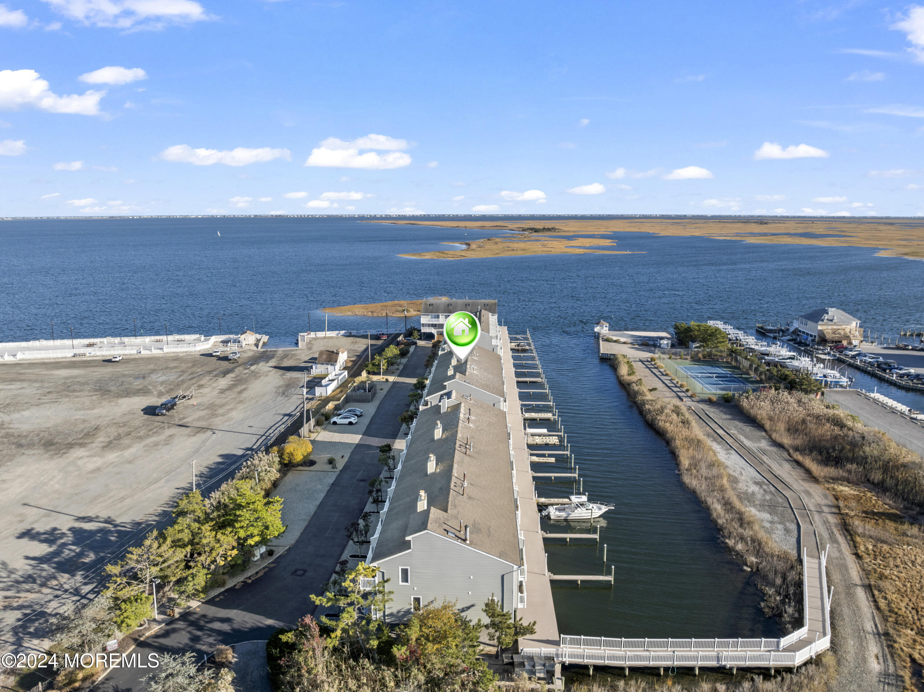441 East Bay Avenue, Unit 10 Barnegat, NJ 08005 - Photo 3 of 53 a view of a balcony with wooden floor