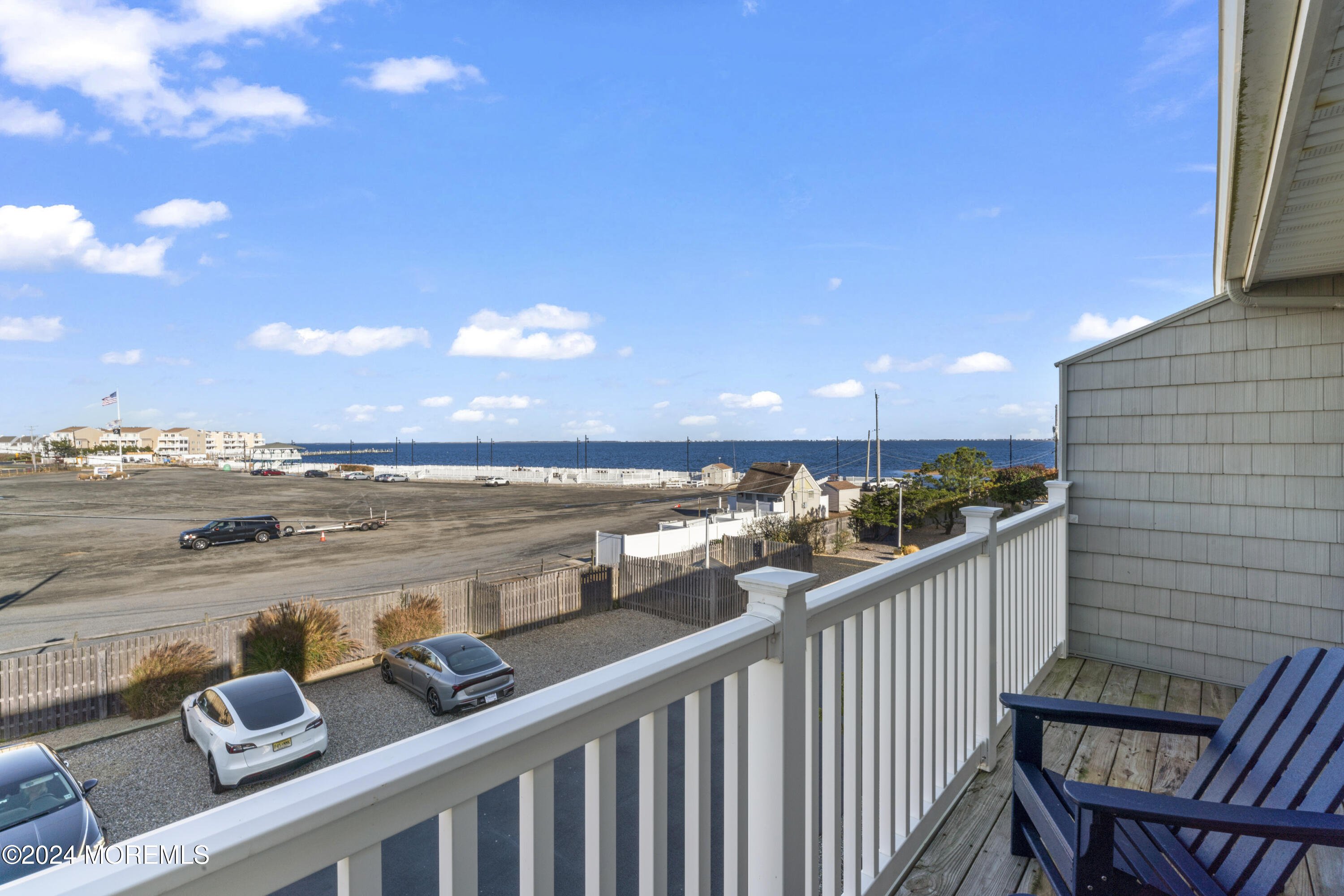 441 East Bay Avenue, Unit 10 Barnegat, NJ 08005 - Photo 32 of 53 a view of a balcony with an outdoor space