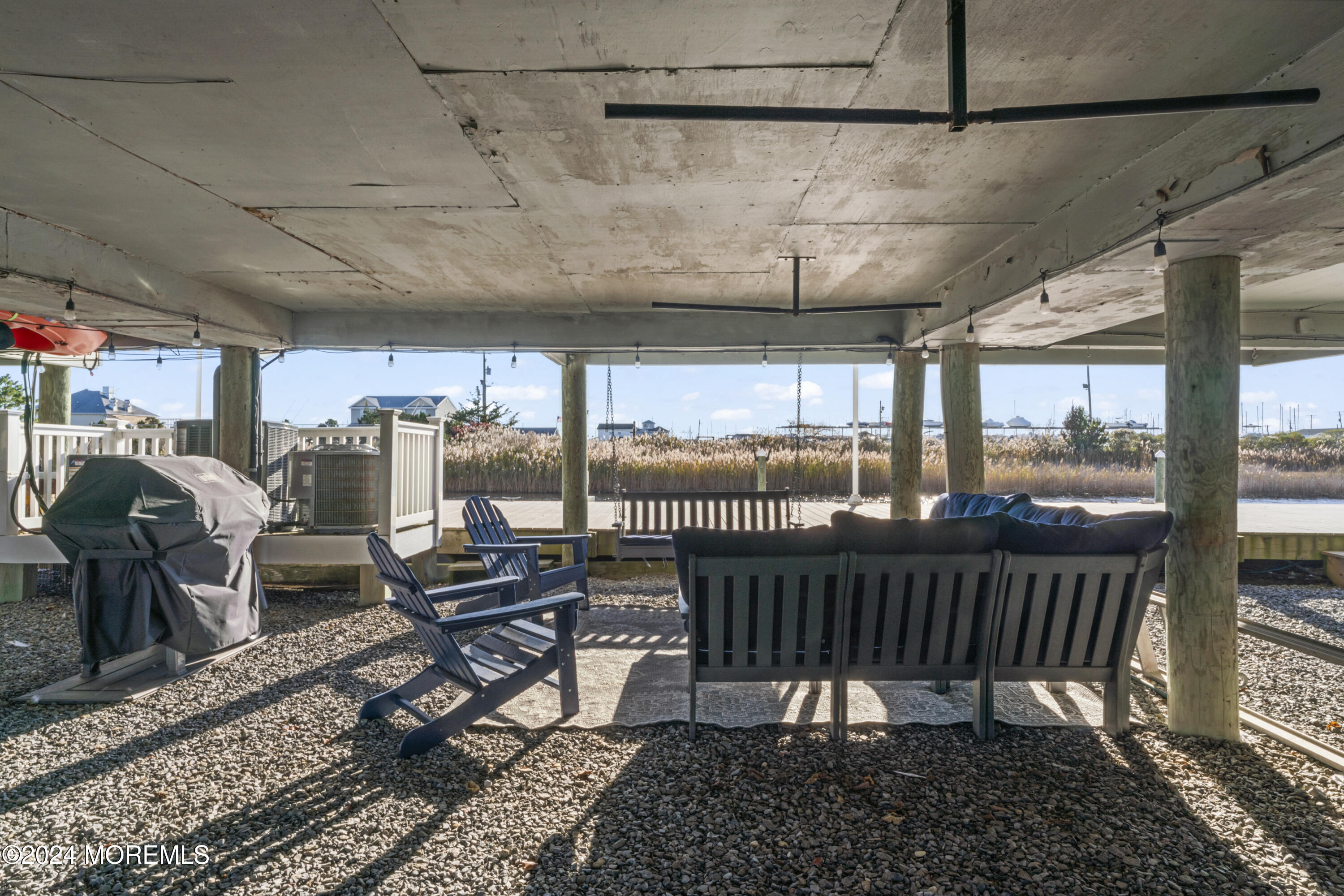 441 East Bay Avenue, Unit 10 Barnegat, NJ 08005 - Photo 35 of 53 a sitting area with furniture and outdoor view