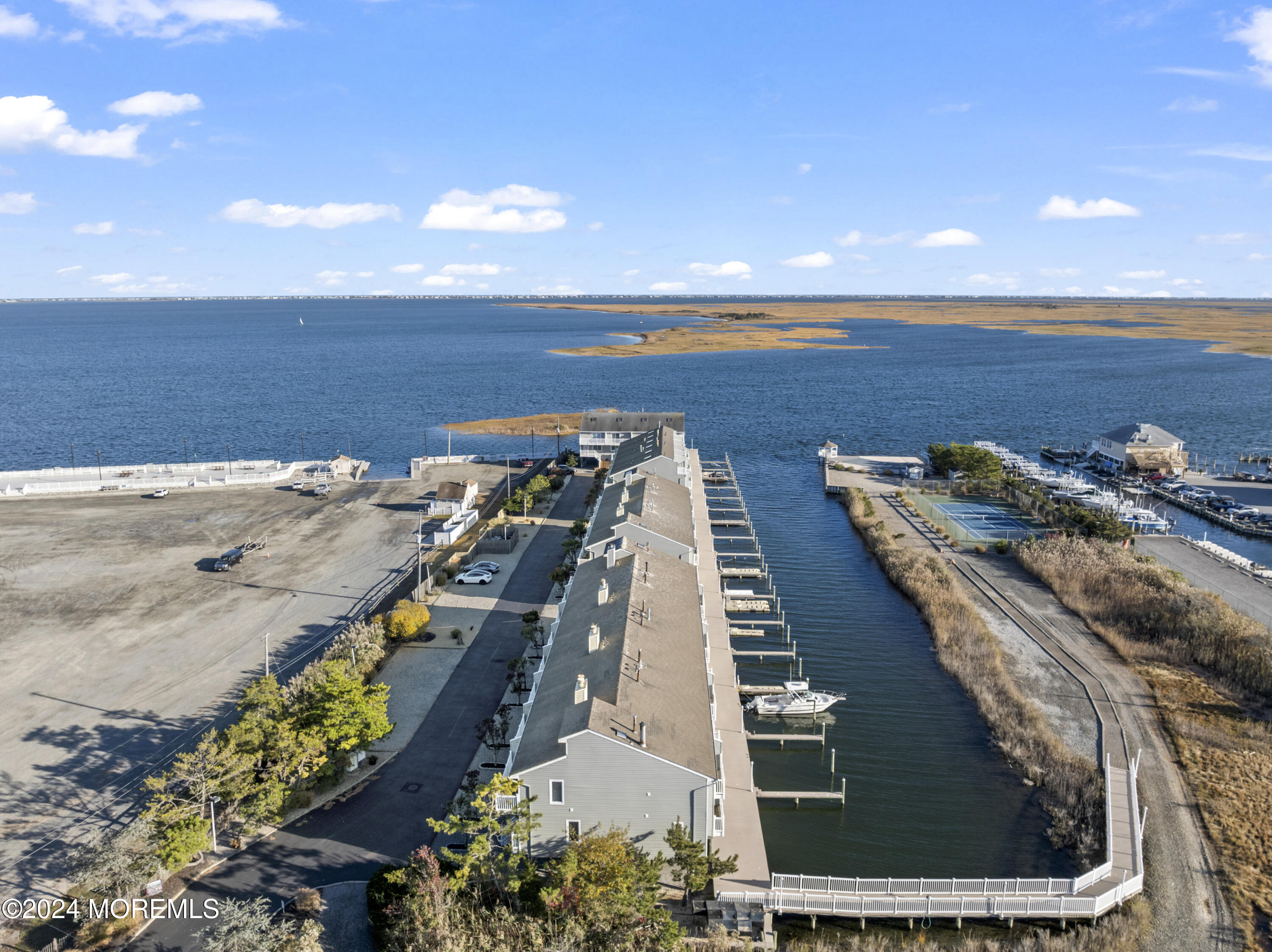 441 East Bay Avenue, Unit 10 Barnegat, NJ 08005 - Photo 39 of 53 a view of a balcony with wooden floor