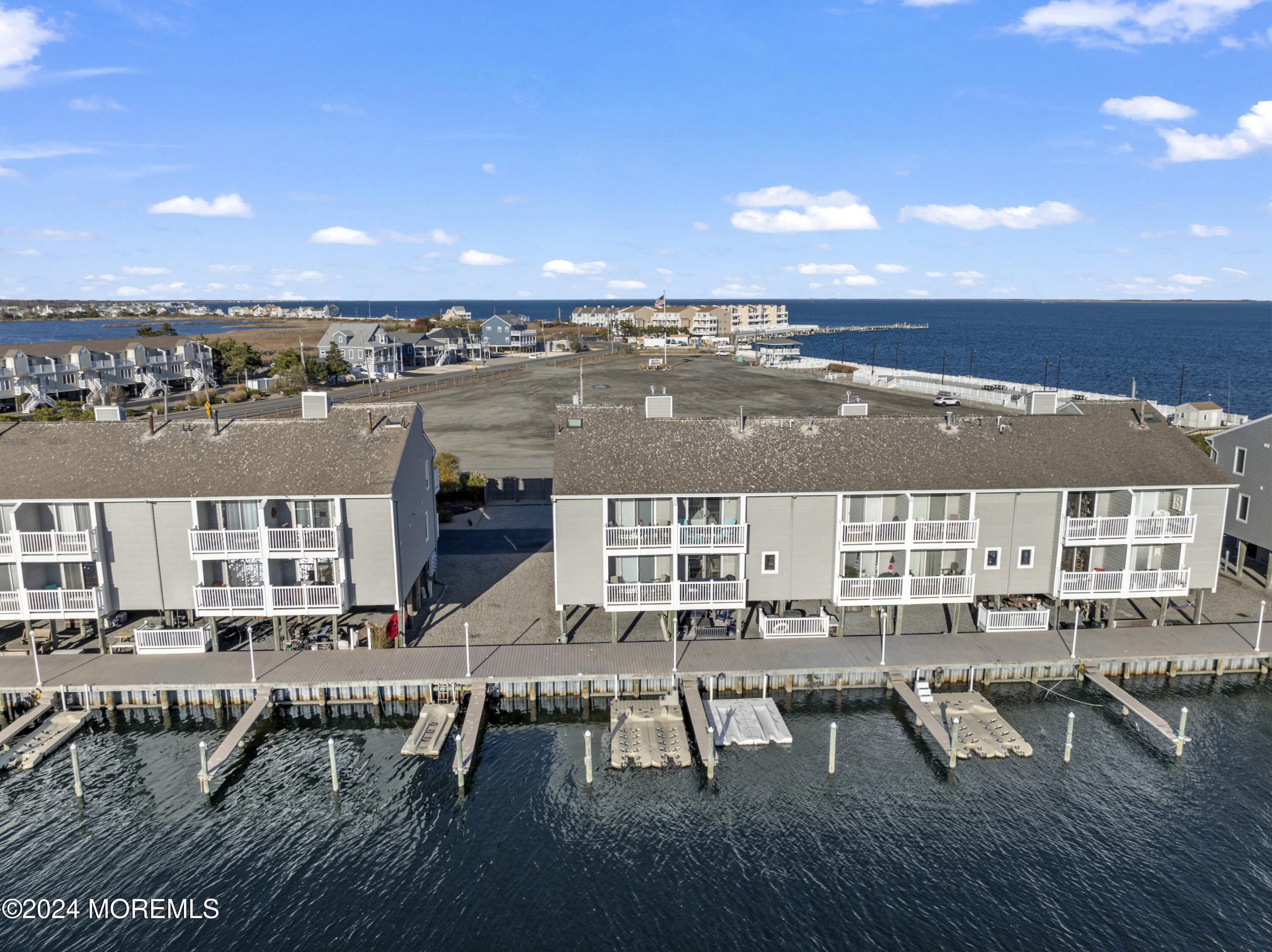 441 East Bay Avenue, Unit 10 Barnegat, NJ 08005 - Photo 41 of 53 an aerial view of a house with swimming pool and patio