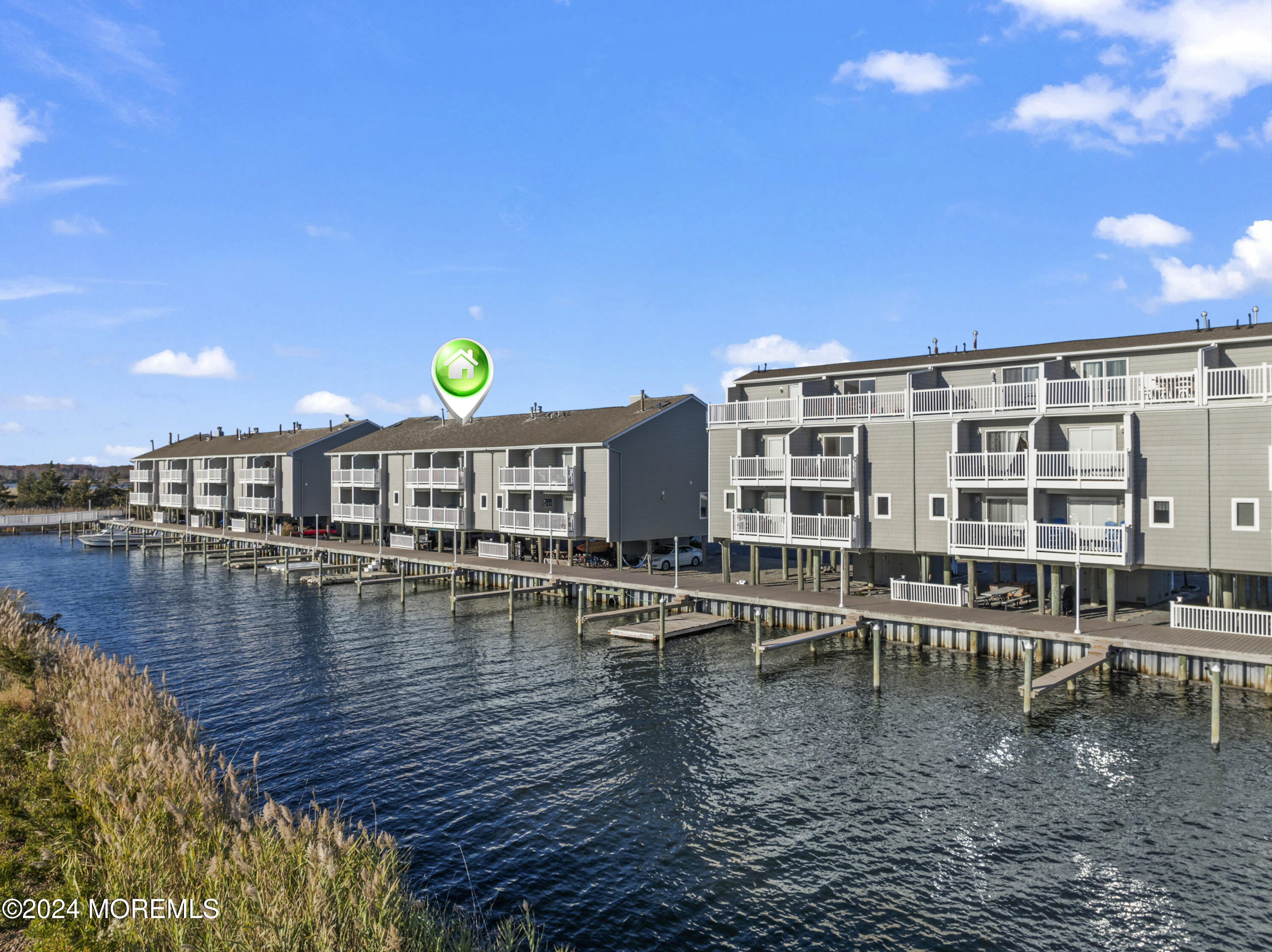 441 East Bay Avenue, Unit 10 Barnegat, NJ 08005 - Photo 8 of 53 a view of a swimming pool with outdoor seating