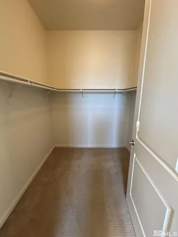 an empty room that has a window