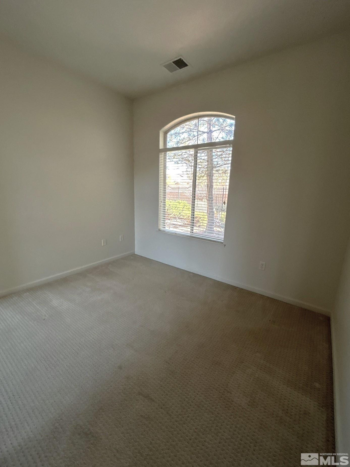 9900 Wilbur May Parkway, Unit 3402 Reno, NV 89521 - Photo 16 of 26 an empty room that has a window