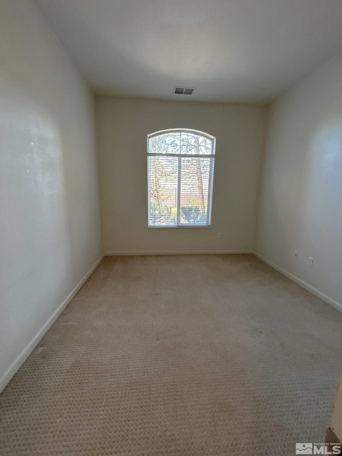 9900 Wilbur May Parkway, Unit 3402 Reno, NV 89521 - Photo 17 of 26 an empty room with a window