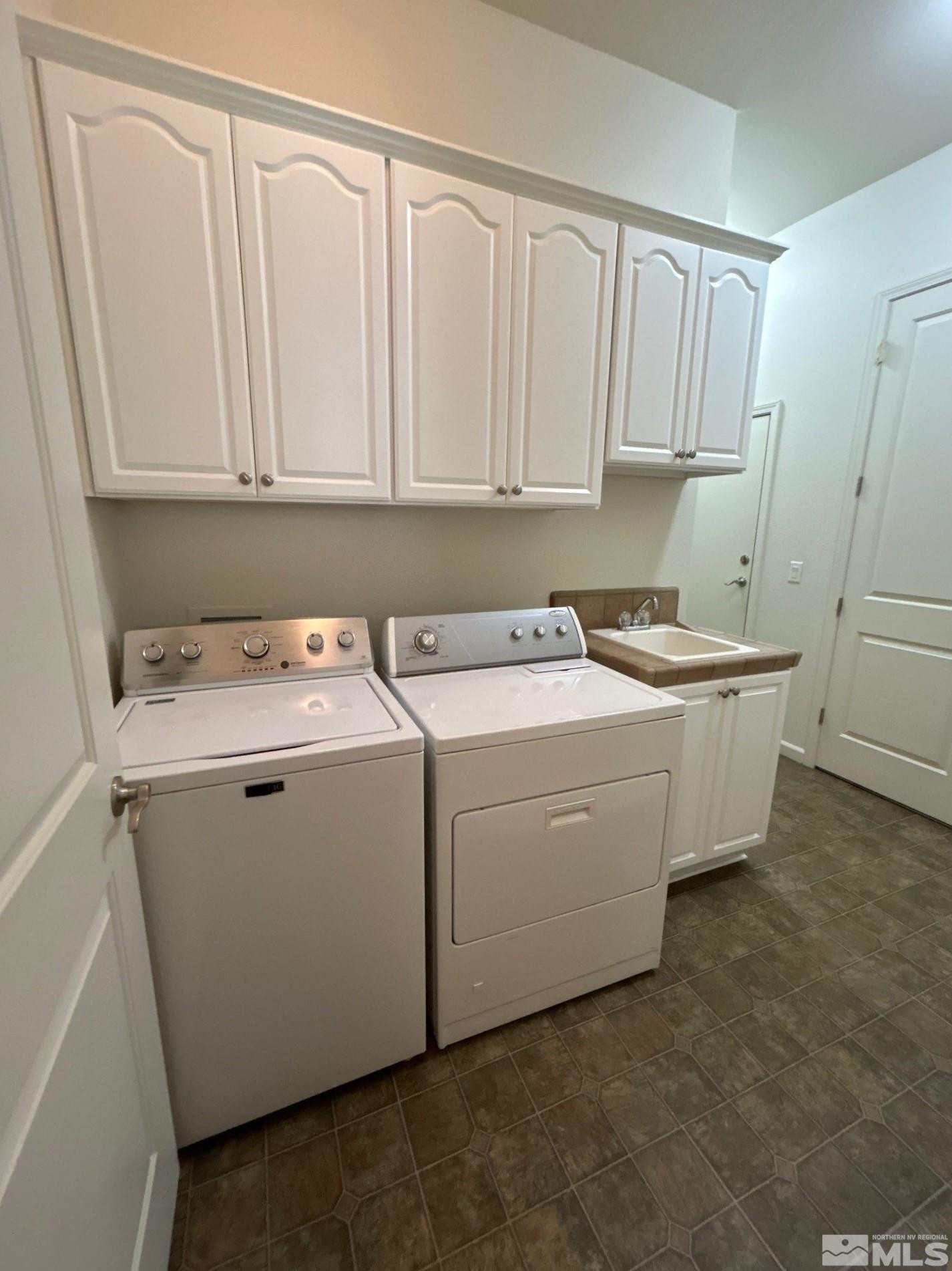 9900 Wilbur May Parkway, Unit 3402 Reno, NV 89521 - Photo 21 of 26 a utility room with dryer and washer