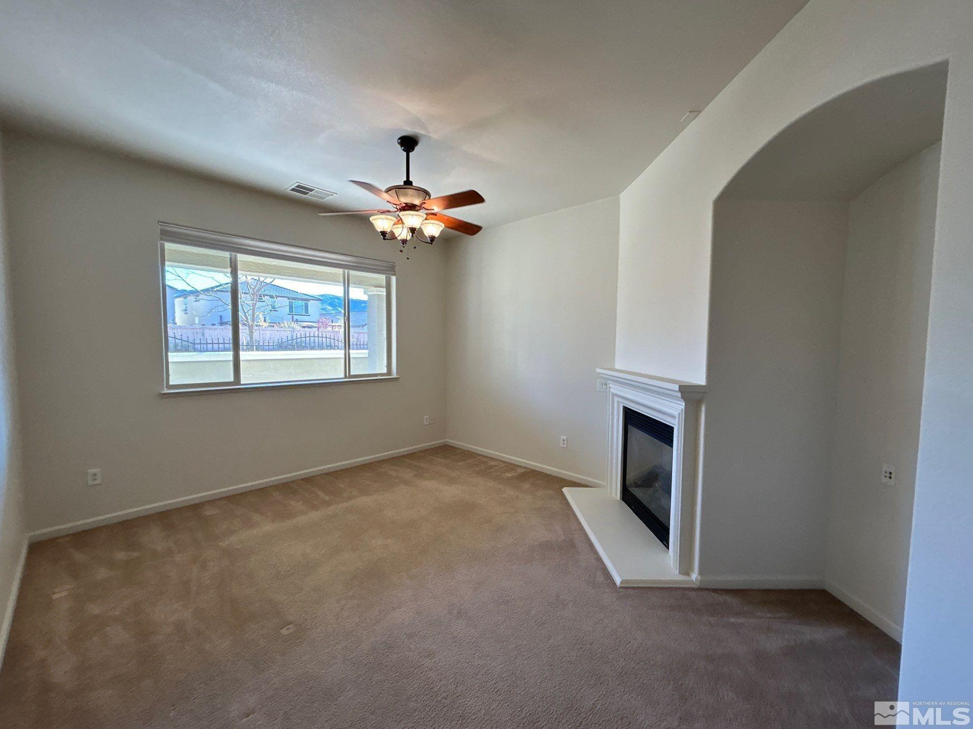 9900 Wilbur May Parkway, Unit 3402 Reno, NV 89521 - Photo 8 of 26 an empty room with windows
