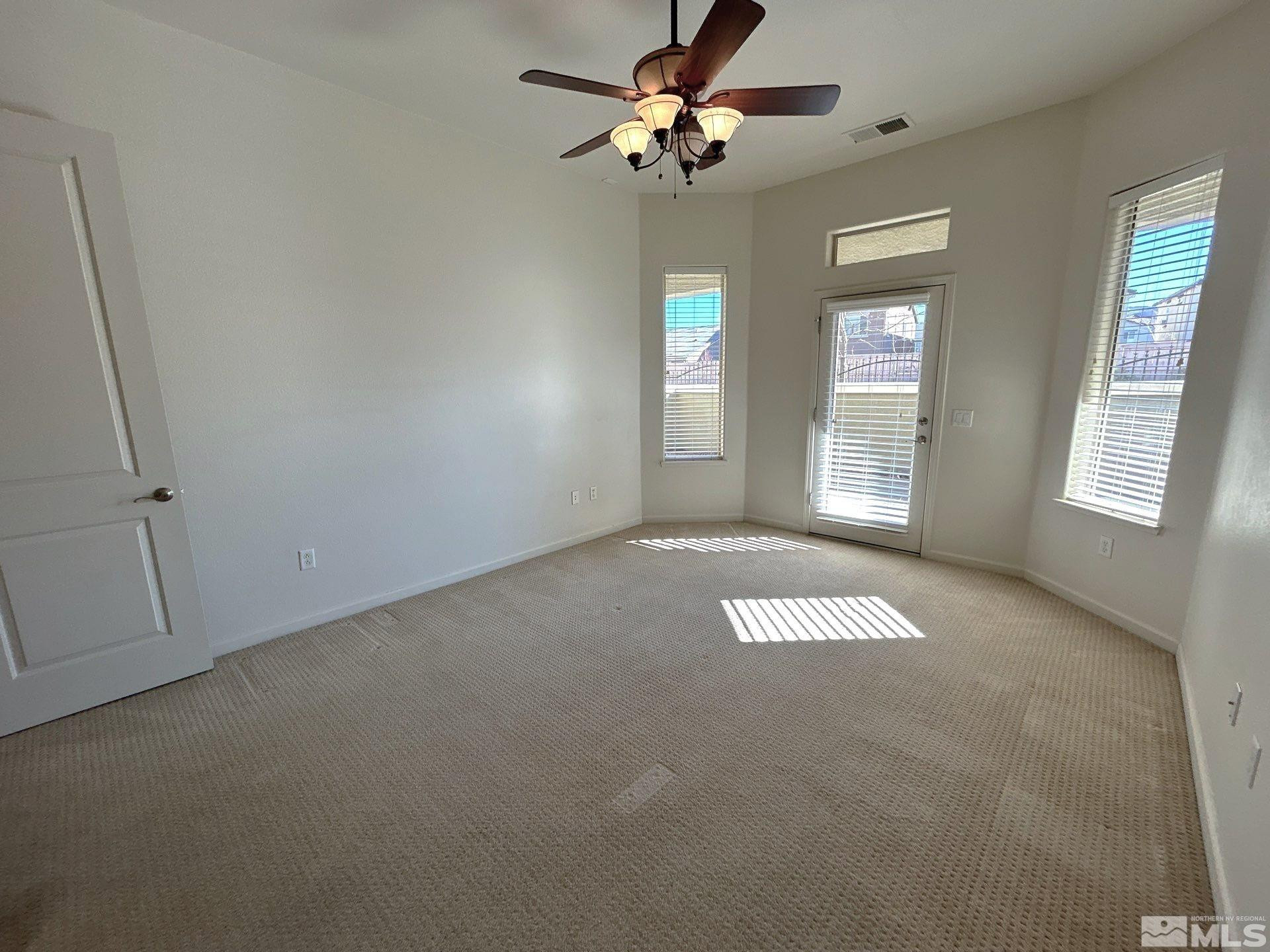 9900 Wilbur May Parkway, Unit 3402 Reno, NV 89521 - Photo 10 of 26 a view of an empty room with a window