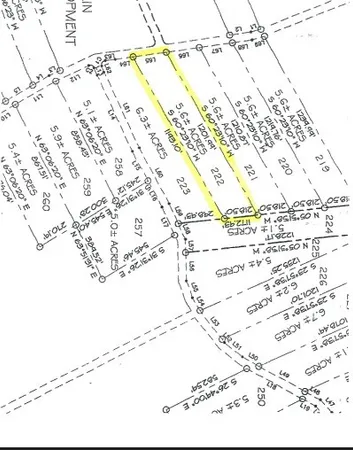 a black and white photo of a lake