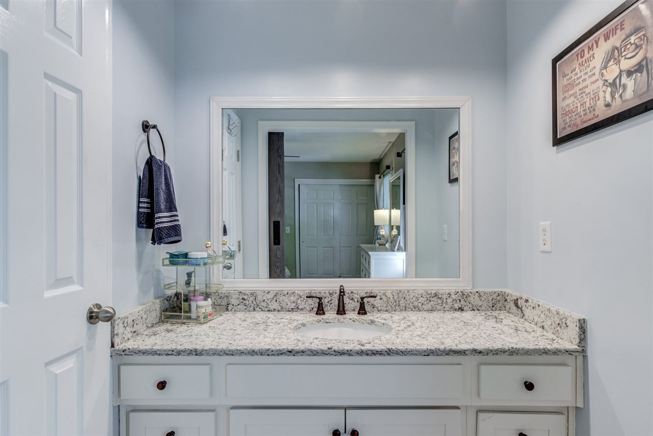 3107 Morningside Drive Raleigh, NC 27607 - Photo 20 of 30 New Owners Bath with new granite-new flooring-new cabinet facing