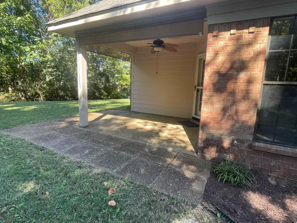 a view of a yard with porch