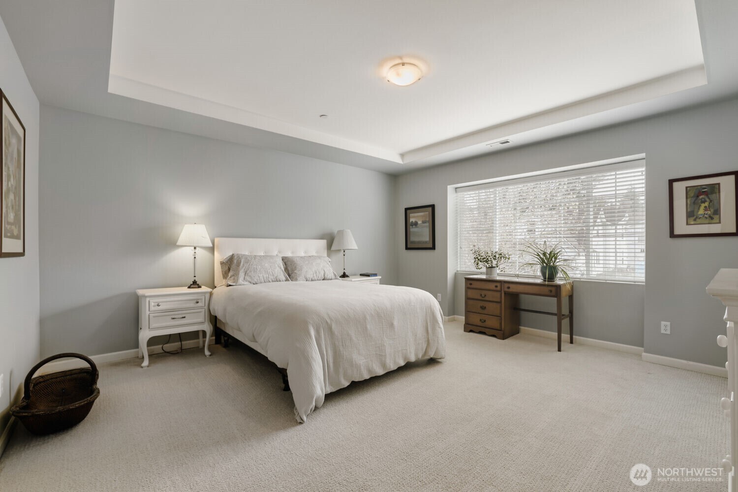 18705 101st Avenue Northeast, Unit 3 Bothell, WA 98011 - Photo 20 of 31 a bedroom with a bed and a window