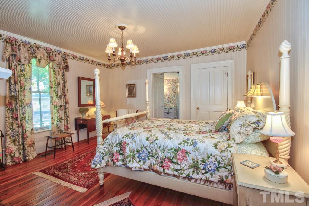 5504 Graham Daniel Road Rougemont, NC 27572 - Photo 11 of 25 a bedroom with bed and window