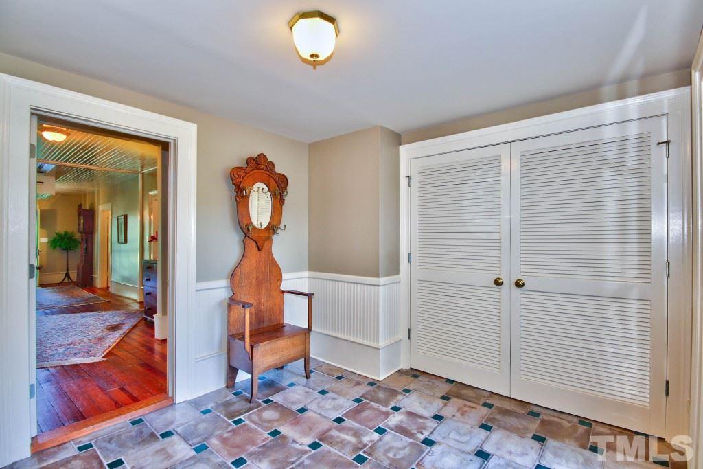 5504 Graham Daniel Road Rougemont, NC 27572 - Photo 12 of 25 a view of a hallway to a livingroom with furniture