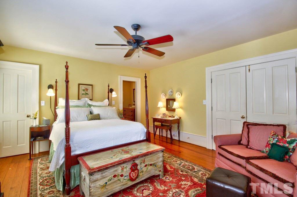 5504 Graham Daniel Road Rougemont, NC 27572 - Photo 14 of 25 a bedroom with furniture and a wooden floor