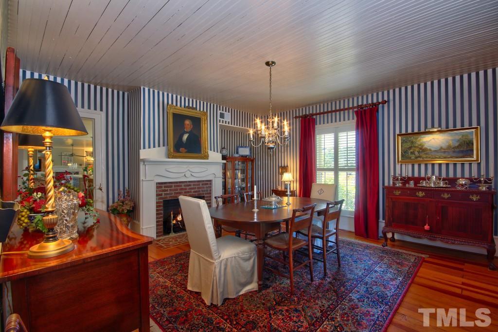 5504 Graham Daniel Road Rougemont, NC 27572 - Photo 5 of 25 a view of a dining room with furniture window and outside view