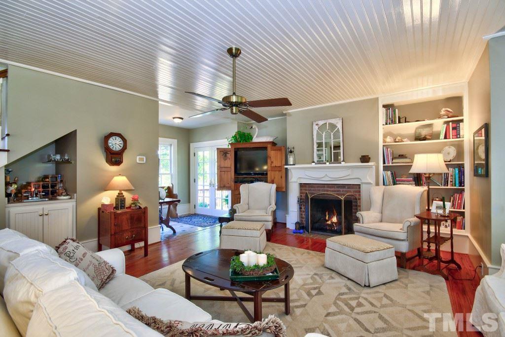 5504 Graham Daniel Road Rougemont, NC 27572 - Photo 9 of 25 a living room with furniture and a fireplace