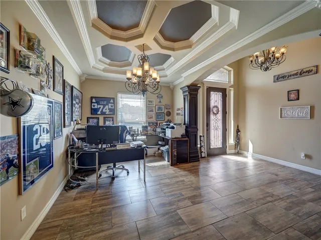 a view of a livingroom with furniture and toys