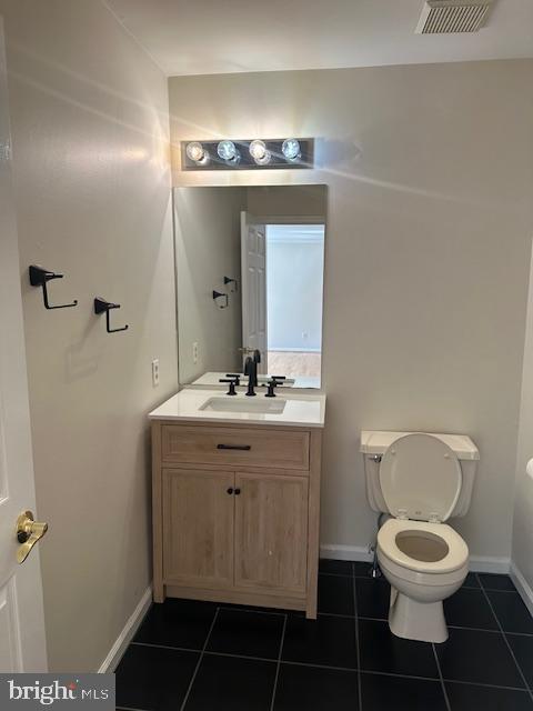 23 Bogey Circle Doylestown, PA 18901 - Photo 11 of 32 a bathroom with a toilet a sink and mirror