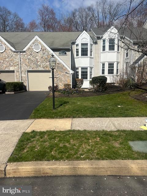 23 Bogey Circle Doylestown, PA 18901 - Photo 30 of 32 a front view of a house with a yard