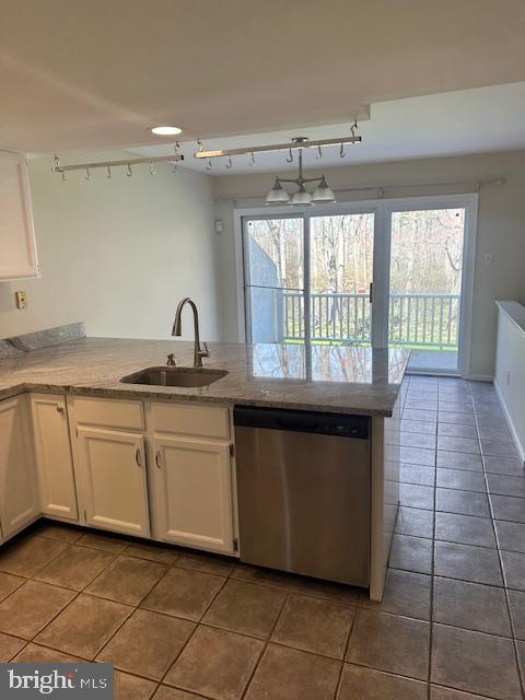 23 Bogey Circle Doylestown, PA 18901 - Photo 3 of 32 a kitchen with granite countertop a stove a sink and a microwave