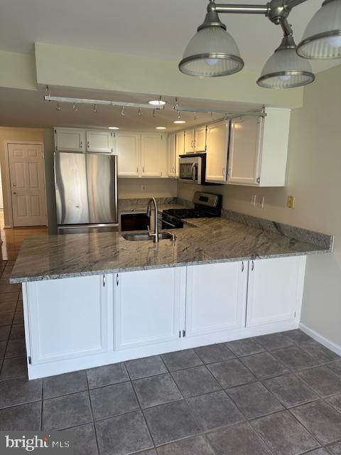 23 Bogey Circle Doylestown, PA 18901 - Photo 4 of 32 a view of a kitchen with granite countertop a sink and cabinets