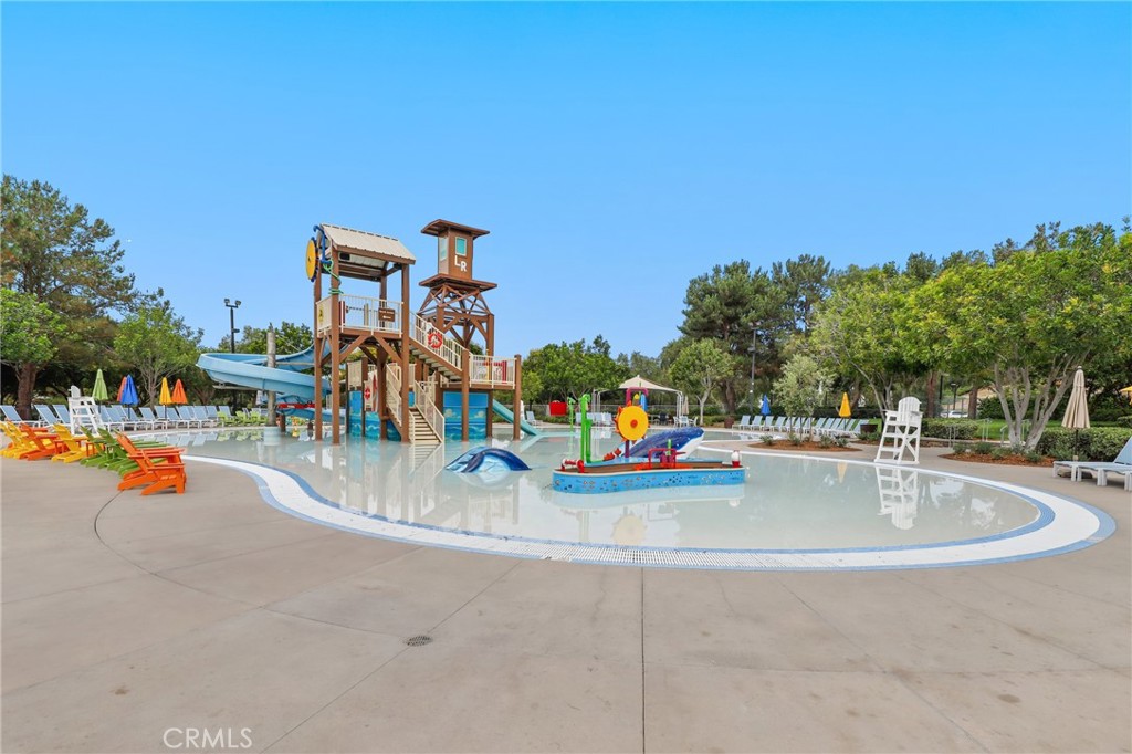 217 Sklar Street Ladera Ranch, CA 92694 - Photo 56 of 59 a view of a park with swings and slides