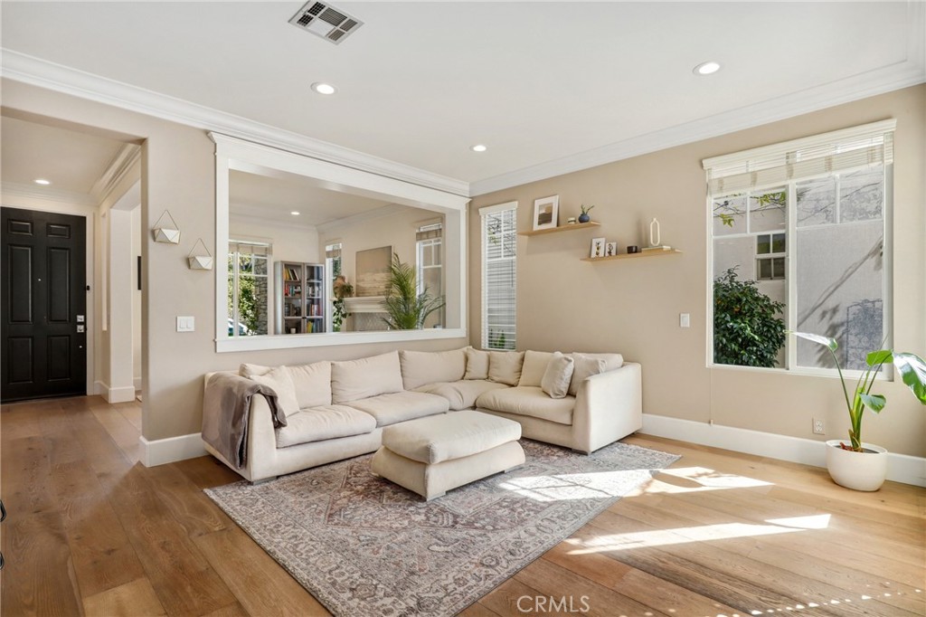 217 Sklar Street Ladera Ranch, CA 92694 - Photo 7 of 59 a living room with furniture and a large window