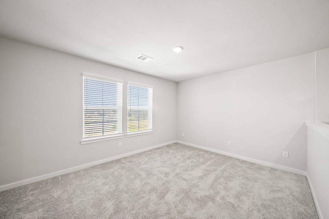 314 Amy Street Angleton, TX 77515 - Photo 20 of 31 an empty room with a window