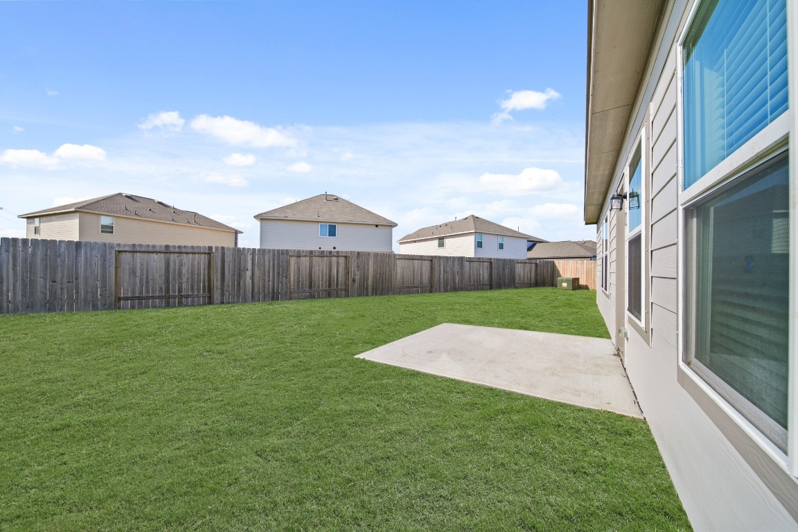 314 Amy Street Angleton, TX 77515 - Photo 4 of 31 a view of an house with backyard and garden