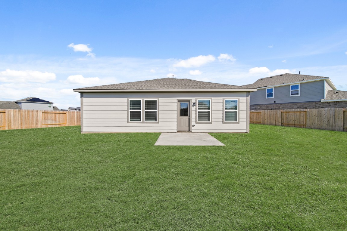 314 Amy Street Angleton, TX 77515 - Photo 5 of 31 a front view of house with yard and green space