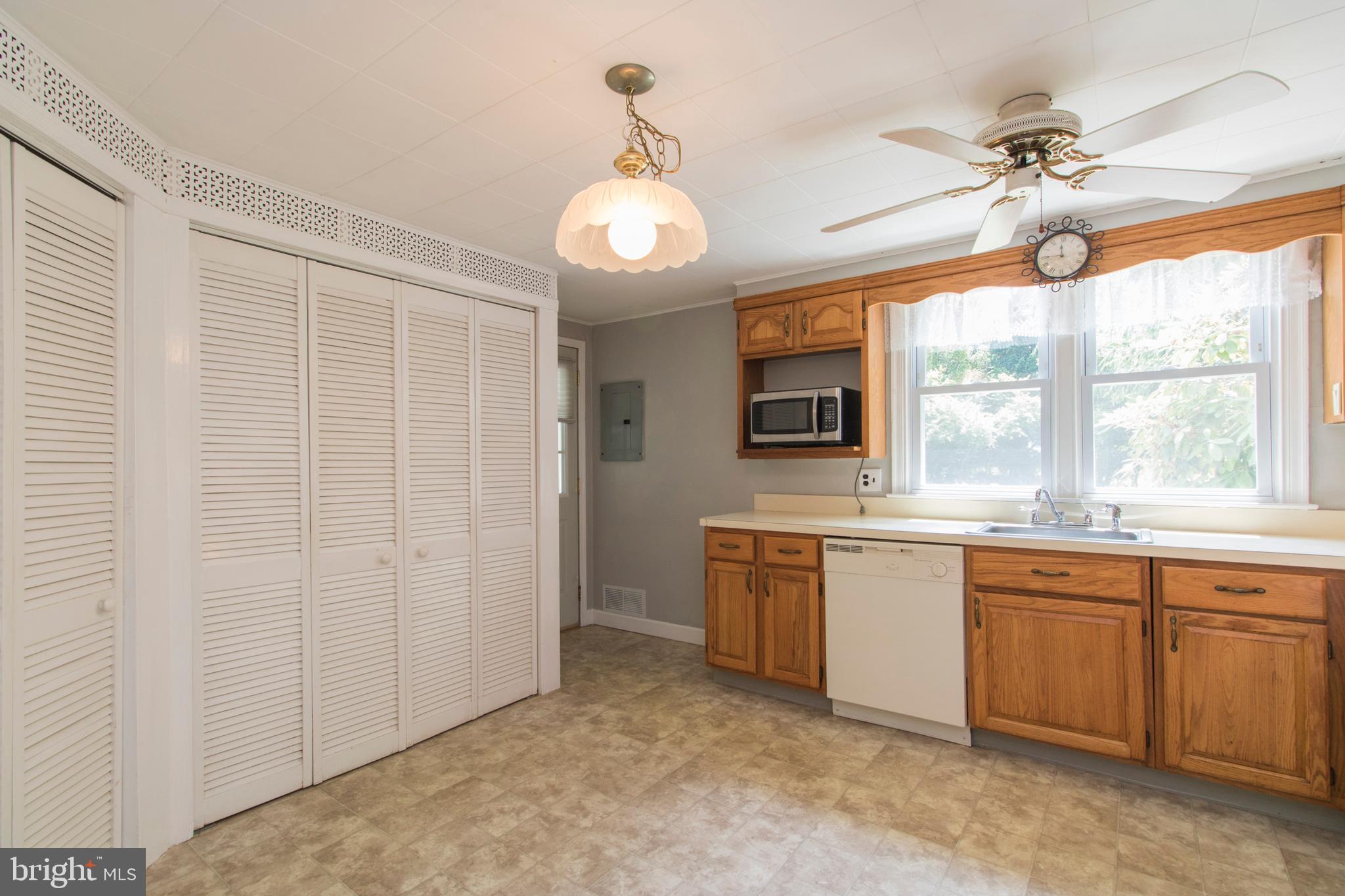 406 Burton Road Oreland, PA 19075 - Photo 13 of 44 Kitchen with utility closet