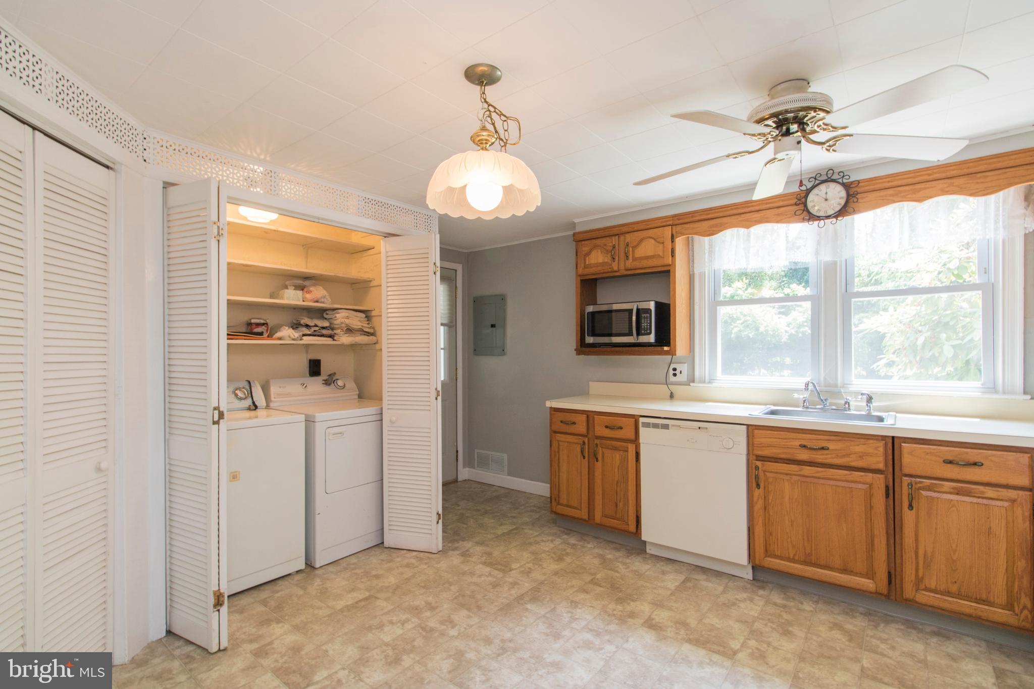 406 Burton Road Oreland, PA 19075 - Photo 14 of 44 Kitchen with laundry closet