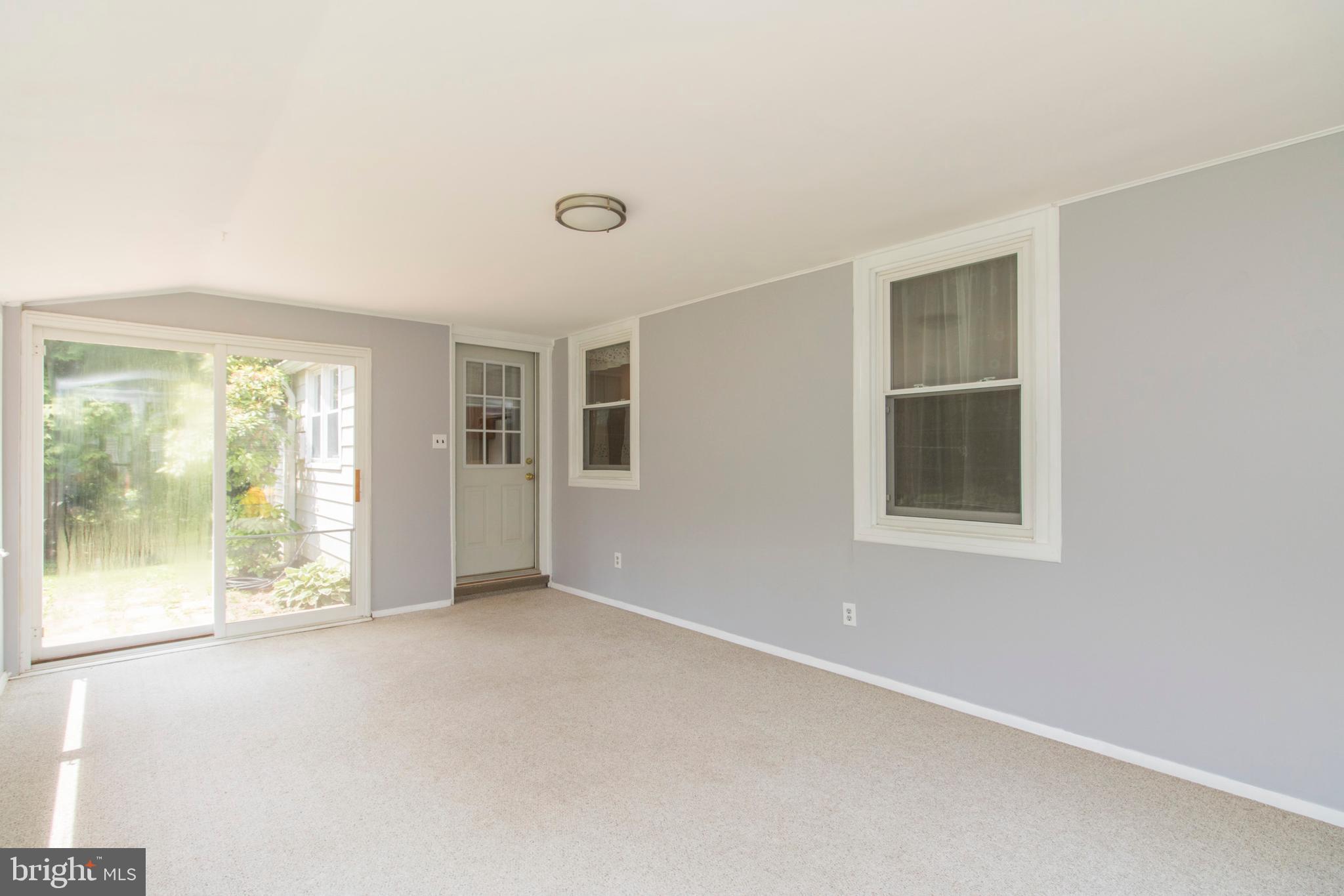 406 Burton Road Oreland, PA 19075 - Photo 20 of 44 Enclosed porch outside of kitchen