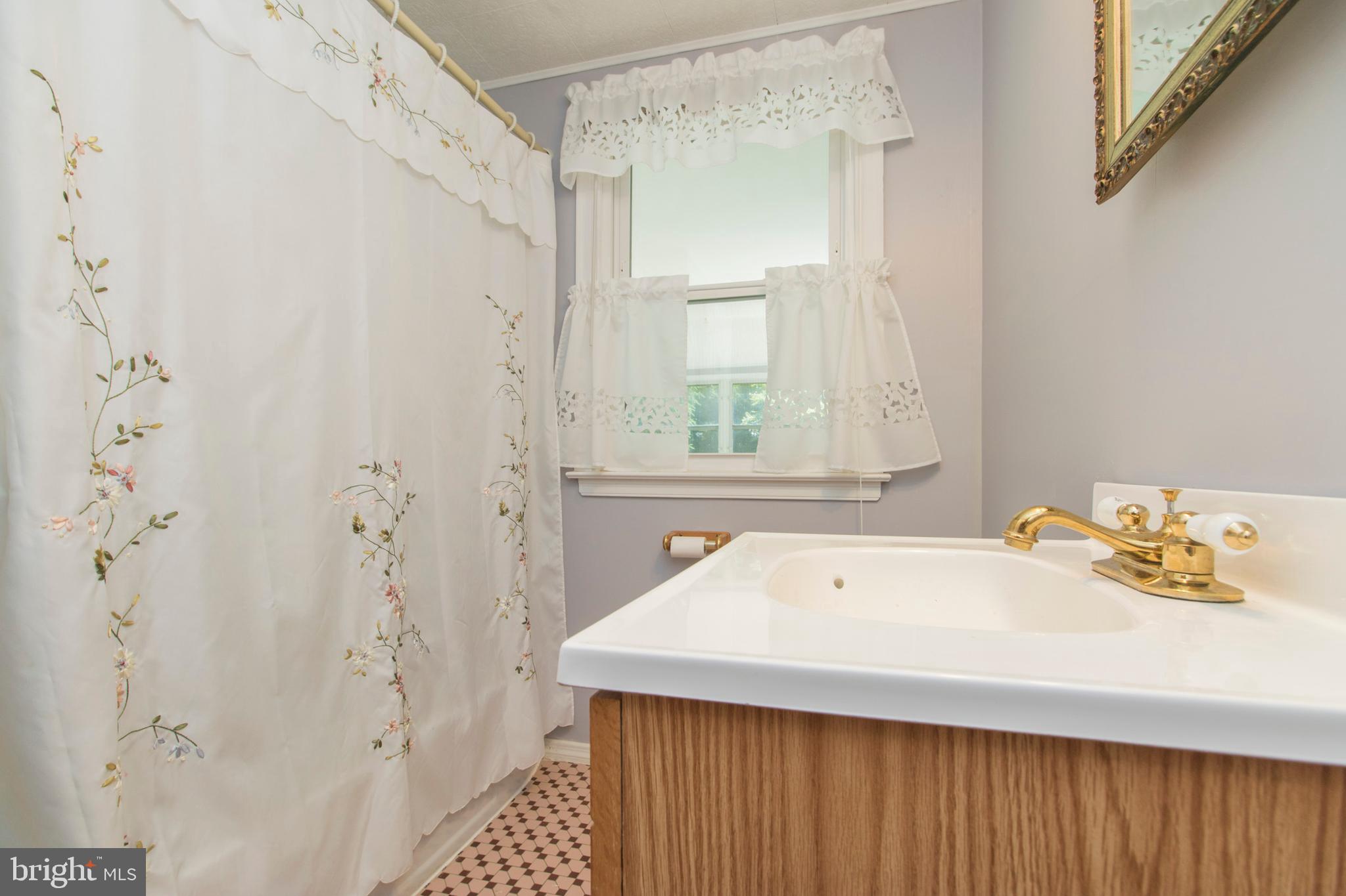 406 Burton Road Oreland, PA 19075 - Photo 29 of 44 1st floor bathroom